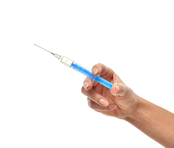 Ruku s lékařskou stříkačkou v ruce připravena k injekci — Stock fotografie