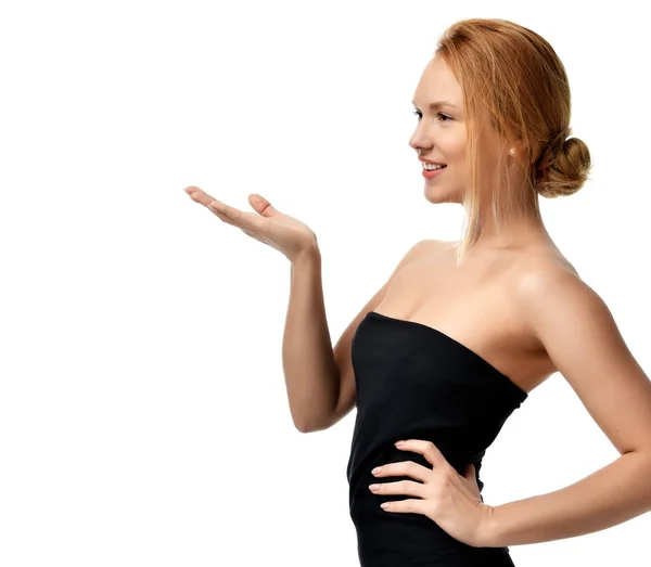 Young happy woman show something with hands for text copy space — Stock Photo, Image