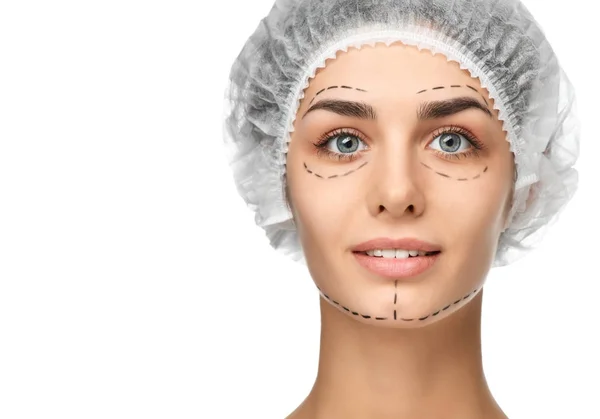 Plastische chirurgie concept perforatie lijnen op gezicht meisje met blauwe ogen — Stockfoto