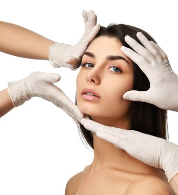 Güzel genç kadın yüz plastik cerrahi ve doktor eller Medikal Ürünler