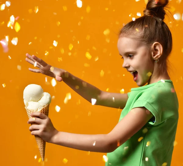 Pretty baby girl kid hold white banana ice cream in waffles cone — Stock Photo, Image