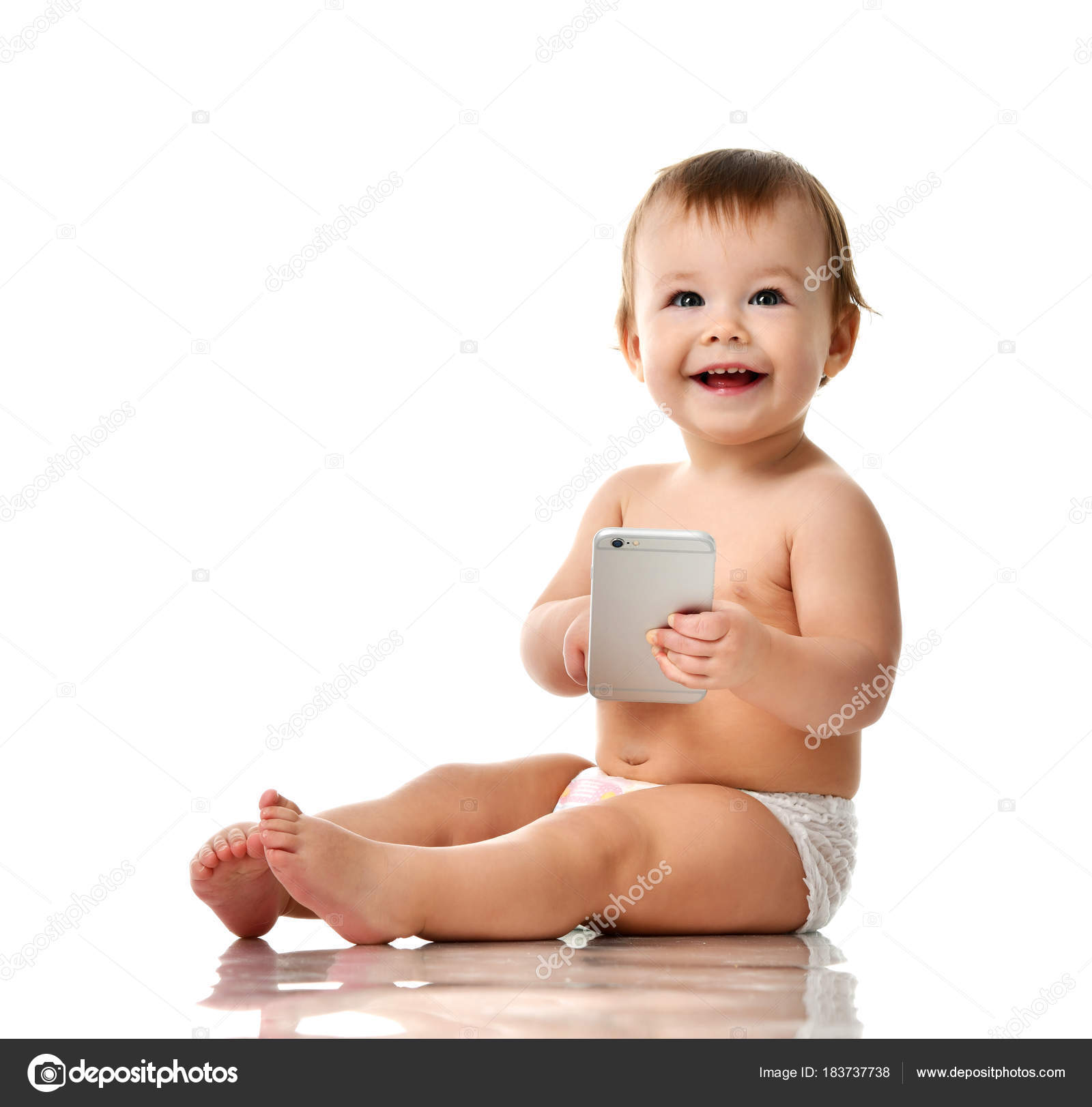 Infant Child Baby Girl Toddler Playing With Mobile Cellphone Happy Smiling Stock Photo By C Dml5050