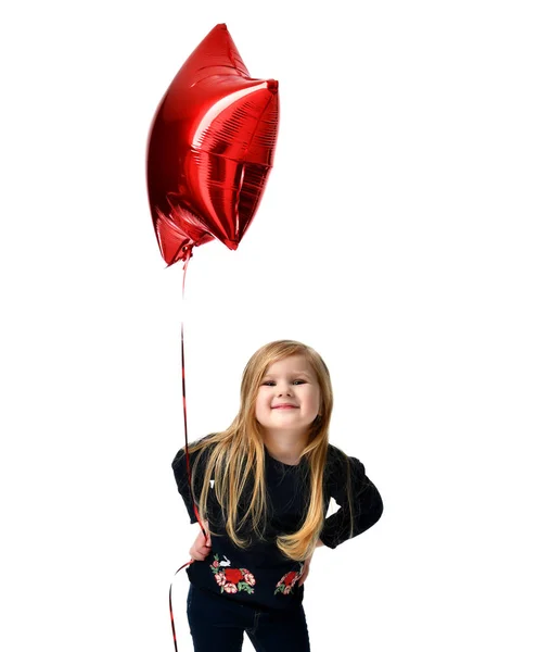 Baby girl kid with big red star balloon isolated — Stock Photo, Image