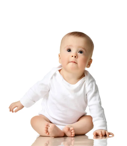 7 month infant child baby  girl toddler sitting in white shirt isolated — Stock Photo, Image