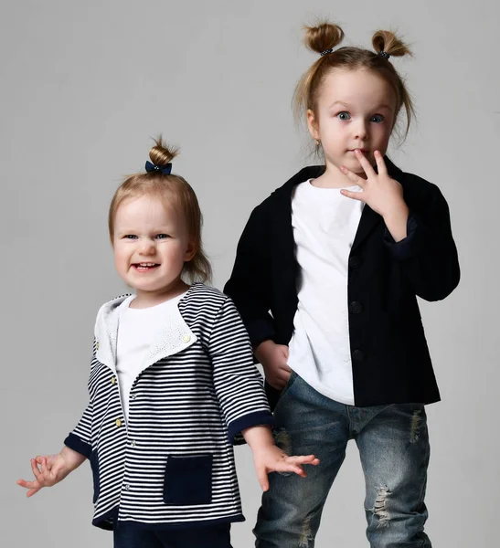 Beautiful little sisters standing together happy smiling — Stock Photo, Image