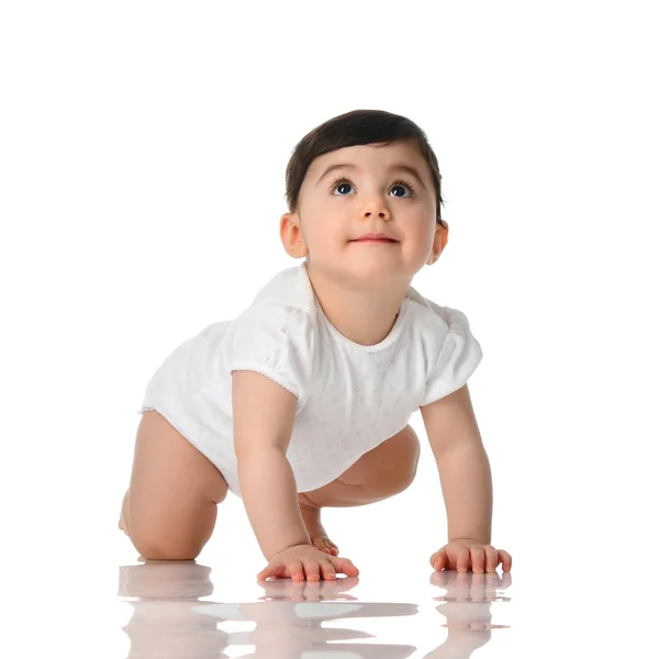 Ten month infant child baby  girl toddler crawling in white shirt looking up isolated — Stock Photo, Image