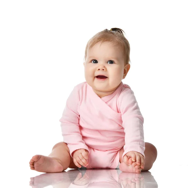 8 month infant child baby girl toddler sitting in pink shirt  isolated on a white — Stock Photo, Image