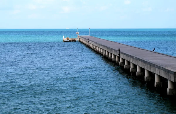 Beautiful pier in a blue sea — Stock Photo, Image