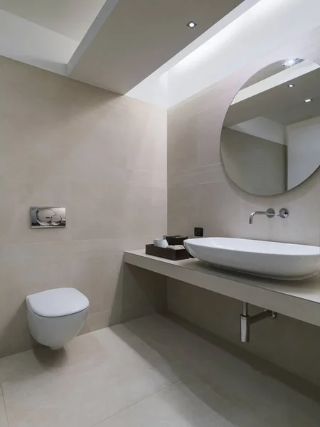 Interior view of a modern bathroom coated on marvble — Stock Photo, Image