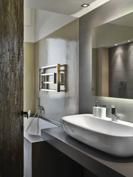 Interior view of a modern bathroom in foreground the counter top — Stock Photo, Image