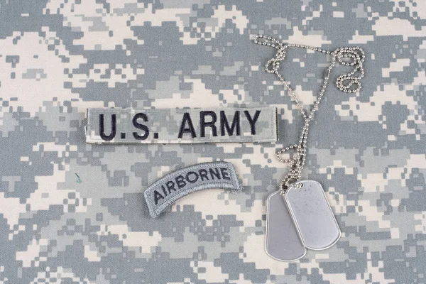 KIEV, UKRAINE - August 21, 2015. US ARMY airborne tab with dog tag on camouflage uniform — Stock Photo, Image