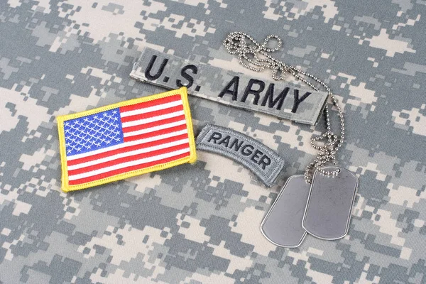 KIEV, UKRAINE - August 21, 2015. US ARMY ranger tab, flag patch,  with dog tag on camouflage uniform — Stock Photo, Image