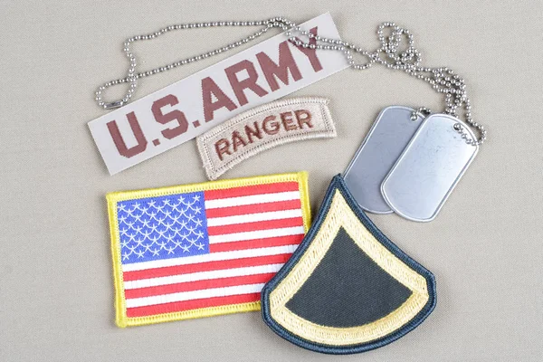 KIEV, UKRAINE - August 21, 2015.  US ARMY Private First Class rank patch, ranger tab, flag patch and dog tag — Stock Photo, Image