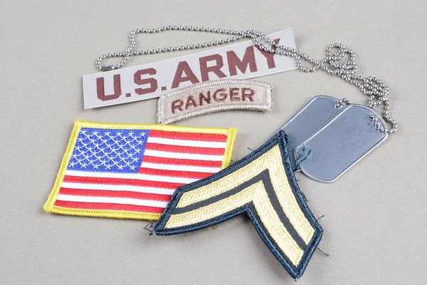 KIEV, UKRAINE - August 21, 2015.  US ARMY Corporal rank patch, ranger tab, flag patch and dog tag — Stock Photo, Image