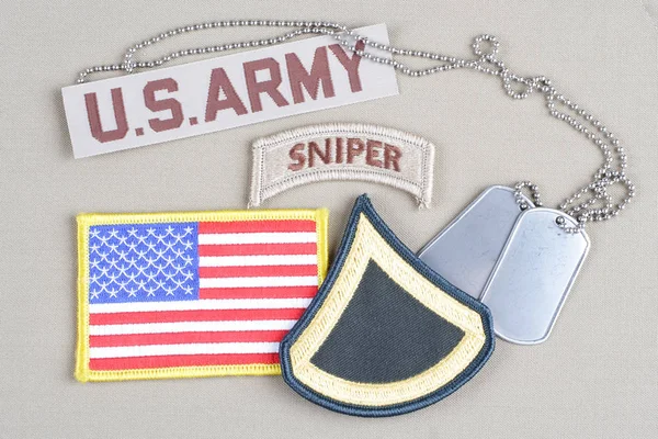 KIEV, UKRAINE - August 21, 2015.  US ARMY Private First Class rank patch, sniper tab, flag patch and dog tag — Stock Photo, Image