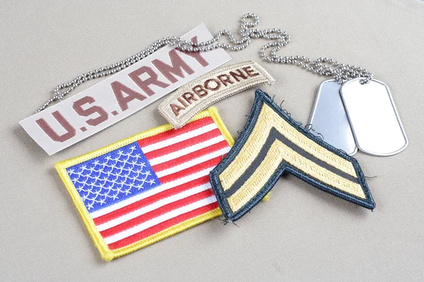 KIEV, UKRAINE - August 21, 2015.  US ARMY Corporal rank patch, airborne tab, flag patch and dog tag — Stock Photo, Image