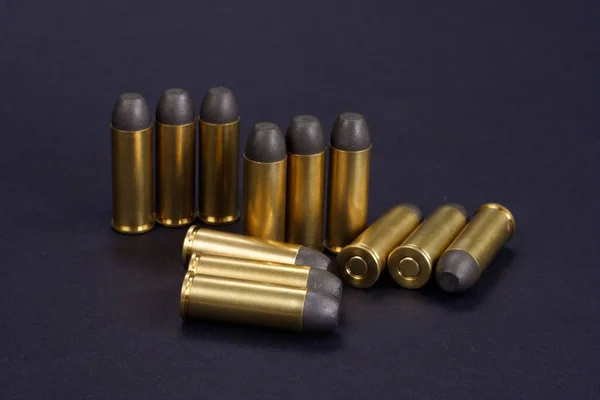 The .45 Revolver cartridges Wild West period on black background