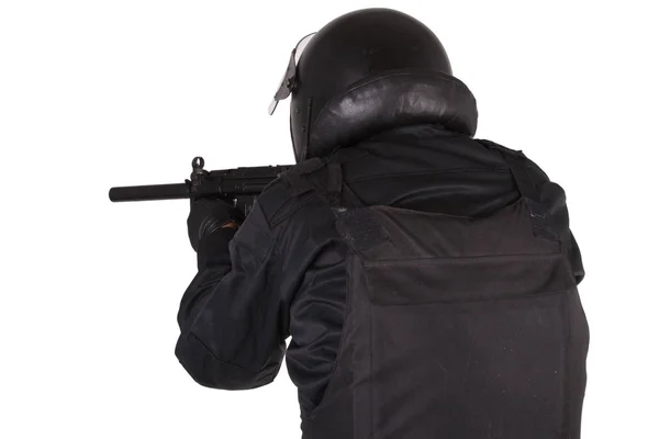 Polizia ufficiale delle forze speciali con mitragliatrice in uniforme nera — Foto Stock