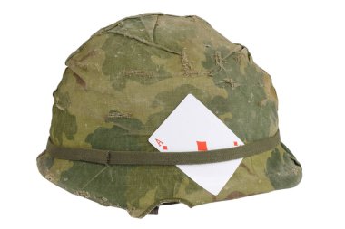 US Army helmet Vietnam war period with camouflage cover and ammo belt  and amulet - playing card ace of diamonds clipart