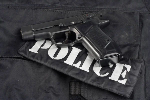 Polícia Pistola Preto Uniforme Fundo — Fotografia de Stock