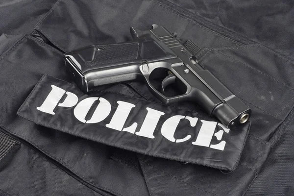 Concepto Policial Pistola Sobre Fondo Negro Uniforme — Foto de Stock