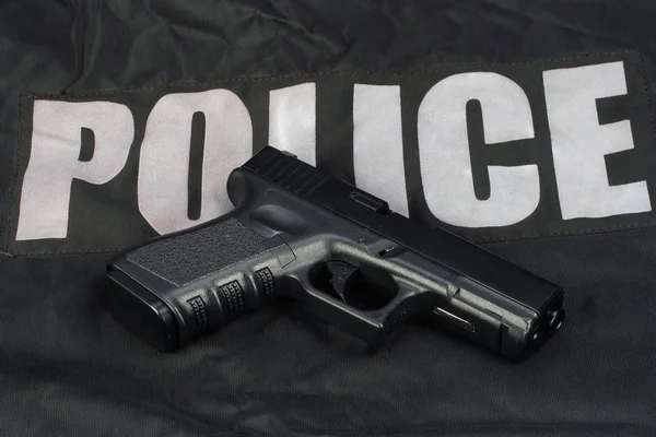 Arma Equipo Policial Sobre Fondo Uniforme Negro —  Fotos de Stock