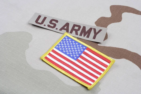 KIEV, UKRAINE - May 9, 2015. US ARMY branch tape and US flag patch on desert camouflage uniform — Stock Photo, Image