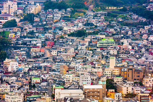 Nagasaki, Japonya cityscape alacakaranlıkta — Stok fotoğraf