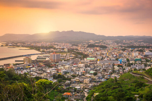 Nago, Okinawa, Japan downtown skyline at sunset.