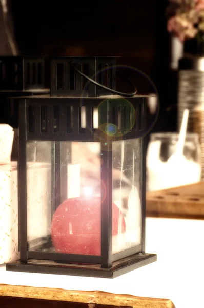 Lantern with a red round candle close-up — Stock Photo, Image