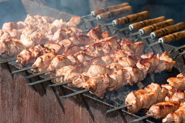 Skewers fried meat on a grill — Stock Photo, Image