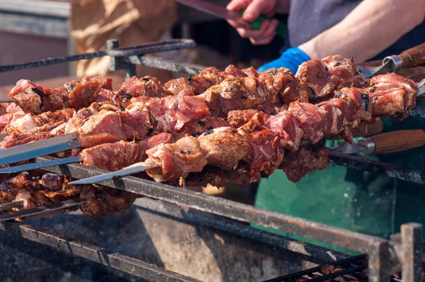 Skewers fried meat on a grill — Stock Photo, Image