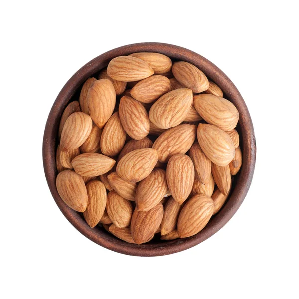 Almonds peeled in a round brown cup top view, isolated — Stock Photo, Image