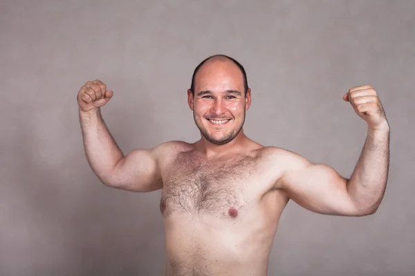 Happy shirtless man posing and showing his strong body Stock Obrázky