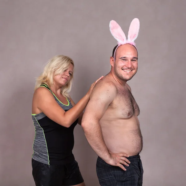 Funny couple with bunny ears Stockbild