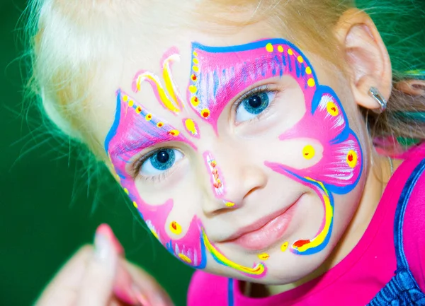 Menina bonita Criança com pintura facial. Maquiagem . — Fotografia de Stock