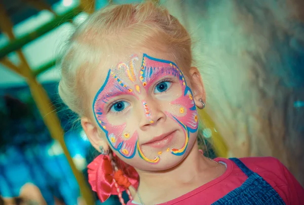 Pretty Girl Child with face painting. Make up.