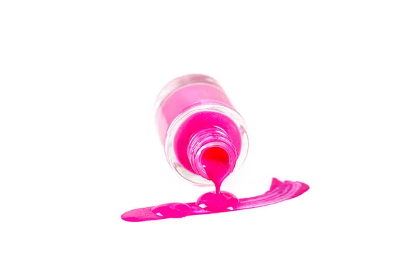 Nail polish dripping from bottle isolated on white — Stock Photo, Image