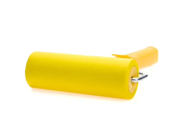 Rodillo de pintura amarillo, aislado sobre fondo blanco. Con sombra . — Foto de Stock