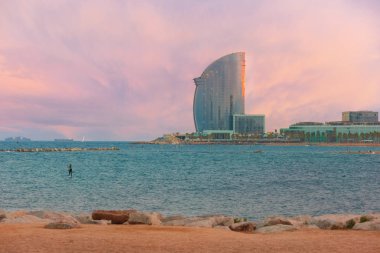 Barceloneta Beach in Barcelona at sunset, Spain clipart