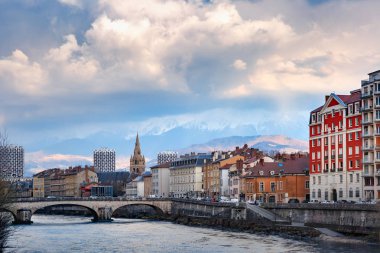 Church, Isere river and bridge in Grenoble, France clipart