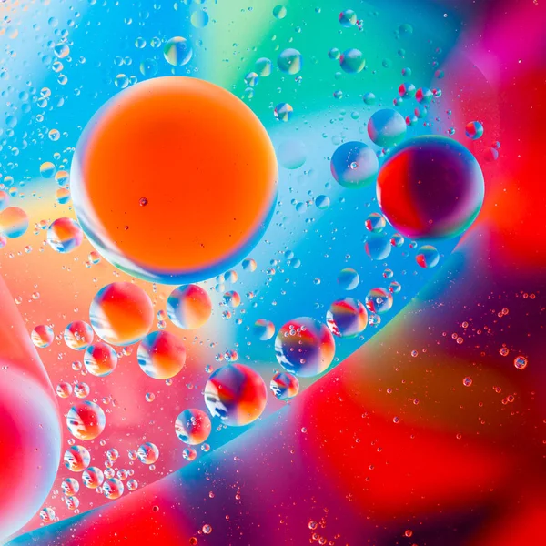 Oil drops on water — Stock Photo, Image