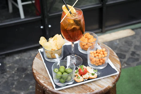Aperitif and snacks in a pub — Stock Photo, Image