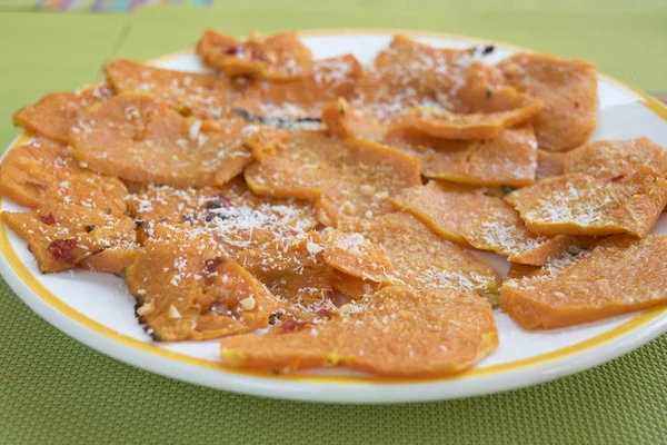 Thin slices of fried pumpkins — Stock Photo, Image