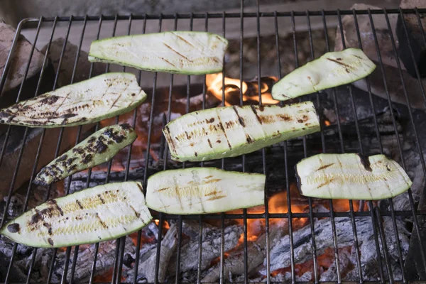 slices of zucchini cooked on the grill