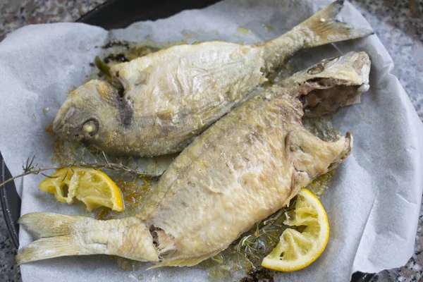 Blue fish fry in a pan — Stock Photo, Image