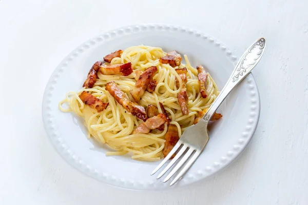 Spaghetti carbonara with a bacon — Stock Photo, Image