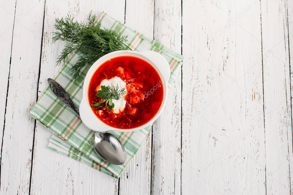 Ukrainian and Russian national red soup borsch with sour cream