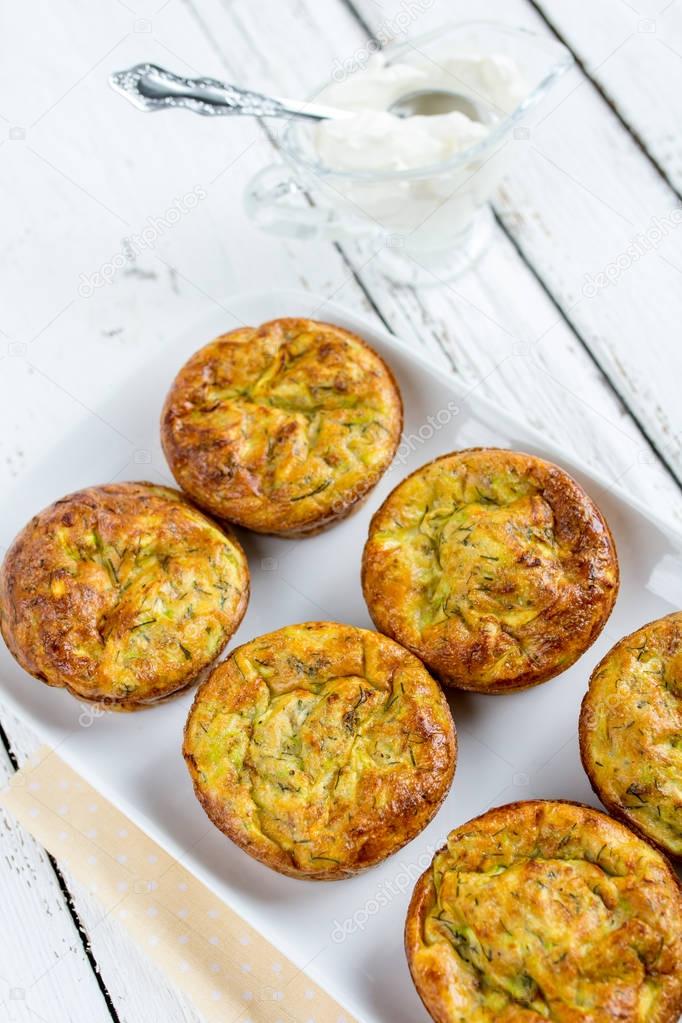 Zucchini muffins with herbs