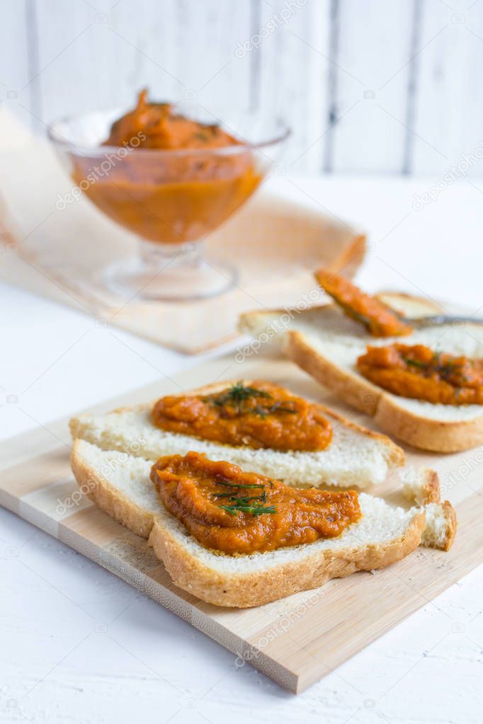 Toasted eggplant caviar on white wooden background